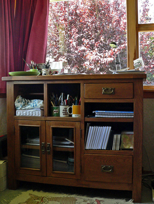 My new workbench and the view of our beautiful plum tree.
